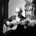 Andrés Segovia playing the guitar